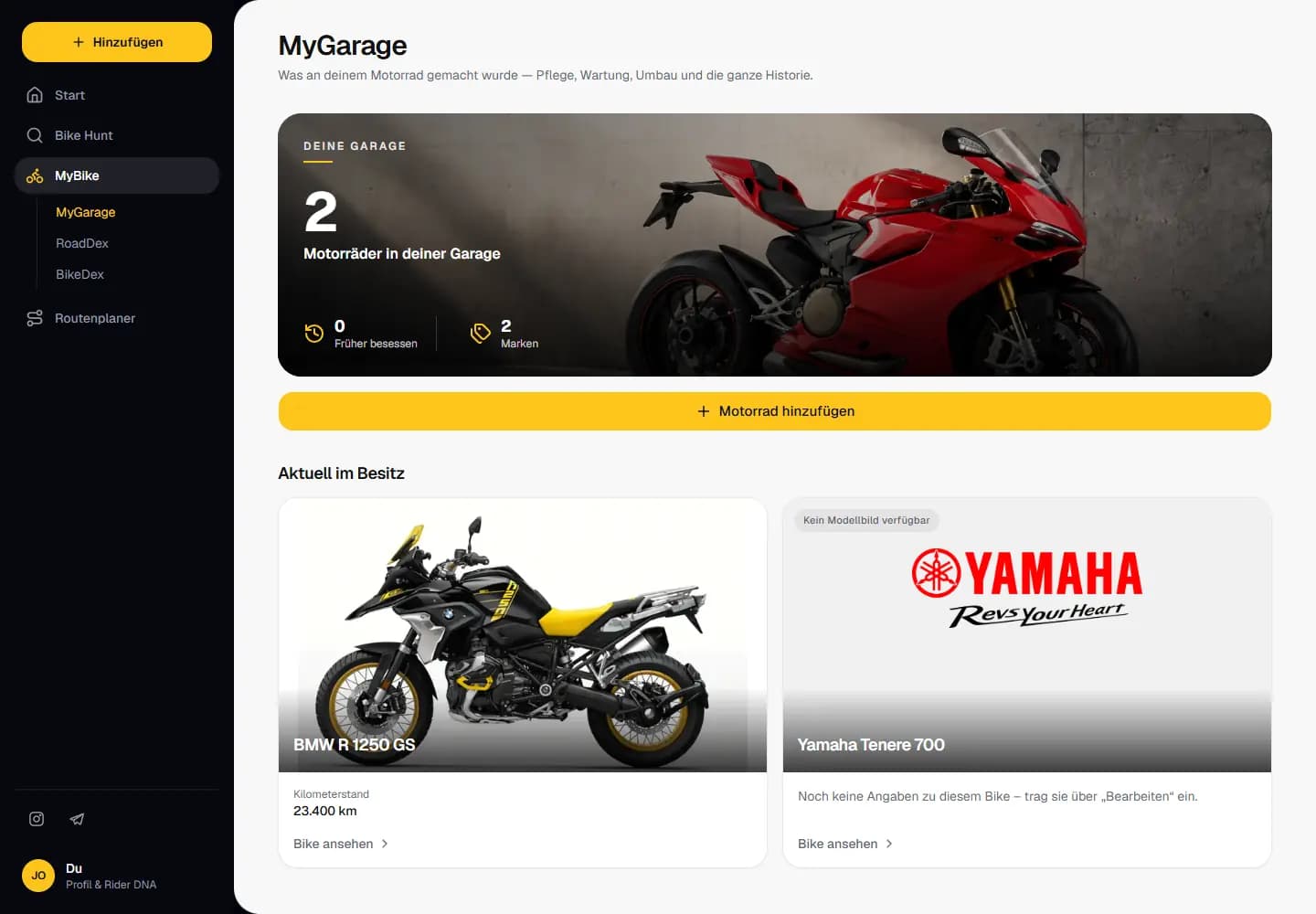 MyGarage: eine BMW R 1250 GS mit Katalogfoto und eine Yamaha Ténéré 700 mit Herstellerlogo, dazu der Kilometerstand